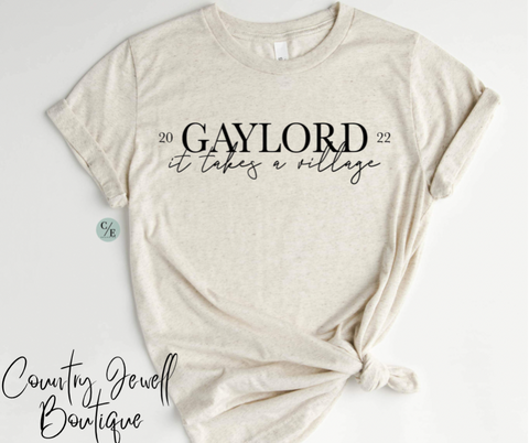 Gaylord Strong It Takes A Village Tee